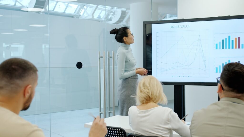 Business presentation with digital dashboard showing analytics and marketing data