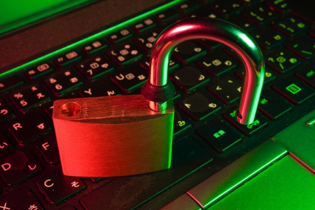 Cybersecurity concept showing padlock on keyboard representing web hosting security measures