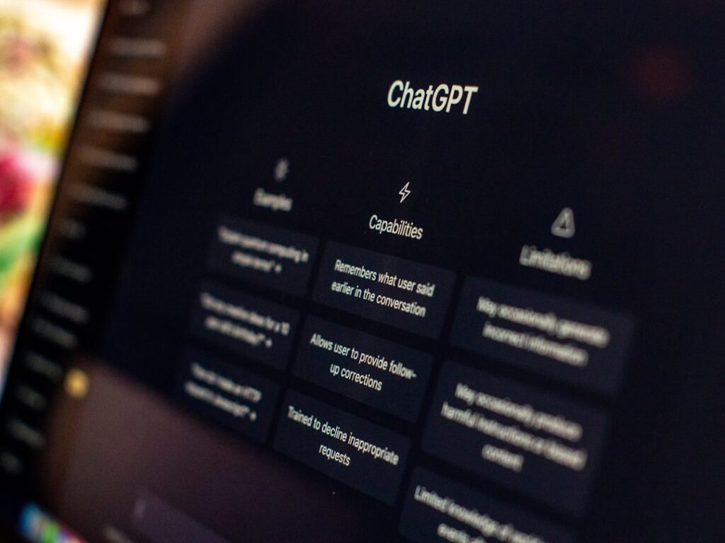 ChatGPT AI interface showing features and capabilities on laptop screen. Photo by Emiliano Vittoriosi