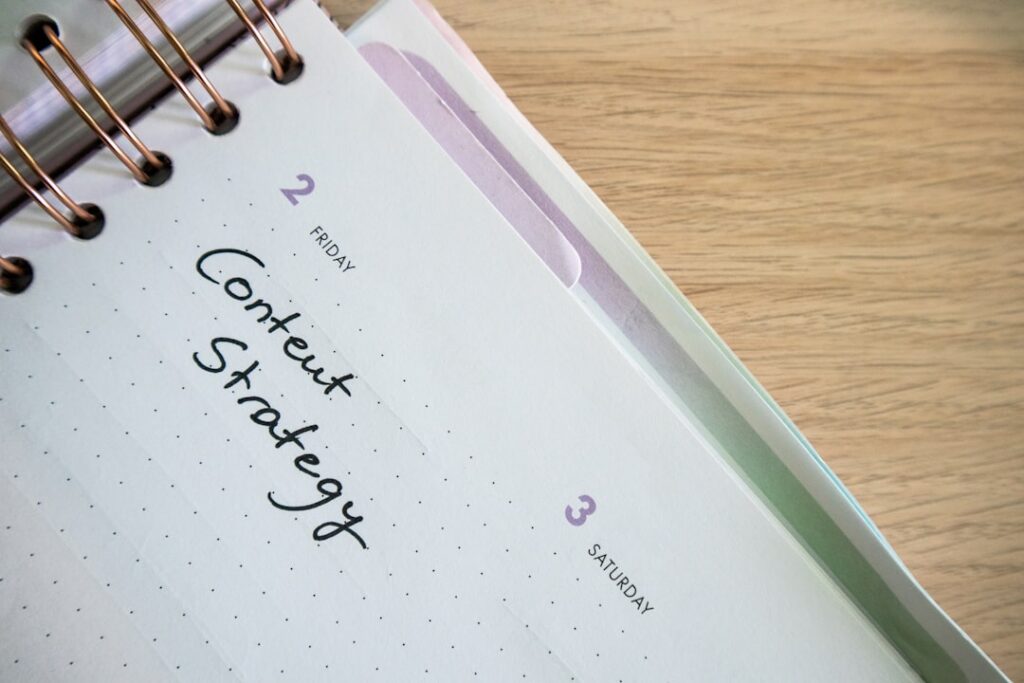 Content strategy planner on desk showing planning and goal-setting for website development