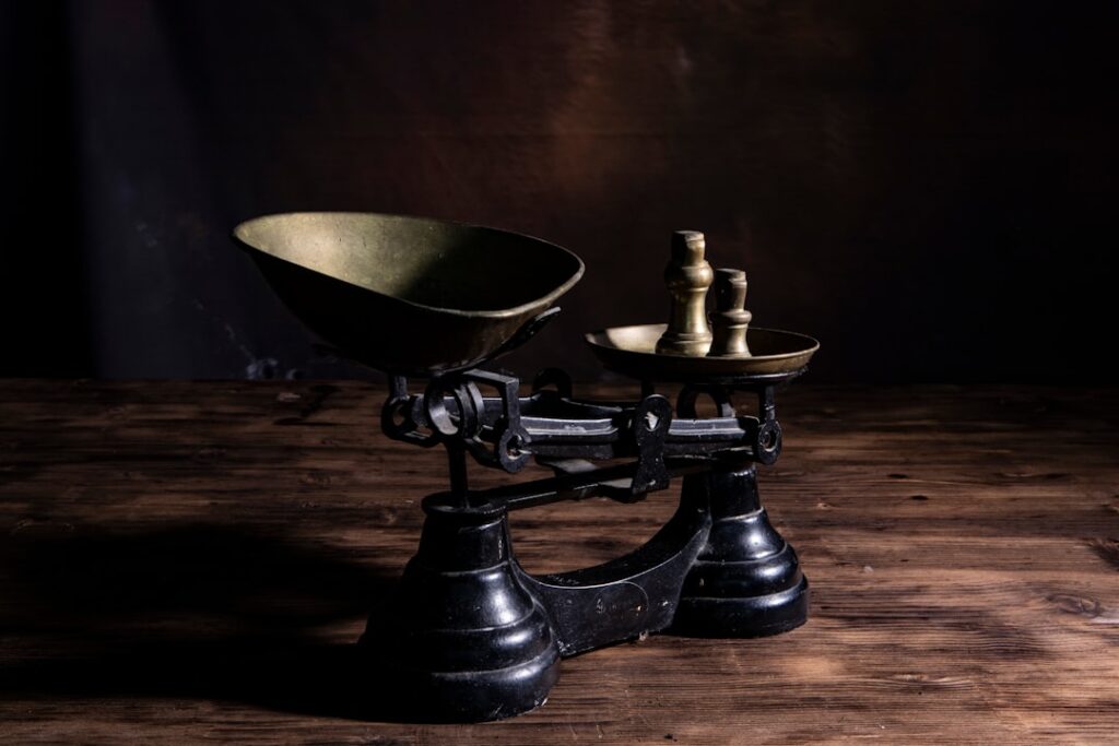 Vintage balance scale representing the weighing of pros and cons in decision making