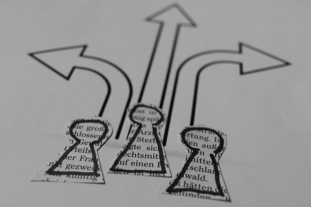 Decision making concept with arrows pointing in different directions representing pros and cons evaluation