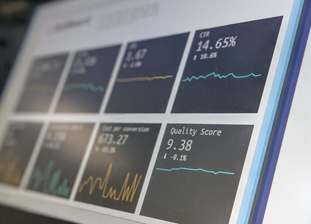 Multiple data reporting dashboards showing analytics metrics and charts