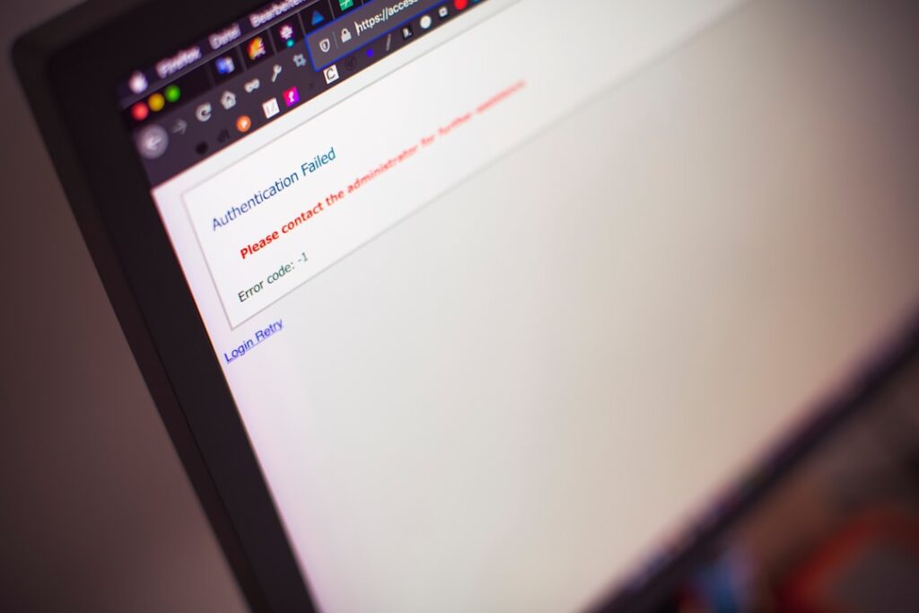 Computer screen showing authentication failed error message requiring troubleshooting