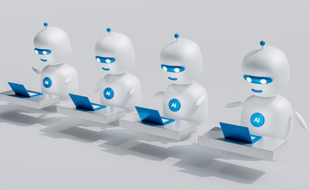 Multiple AI robots working at laptops, representing a comparison of AI tools like ChatGPT. Photo by Unsplash.